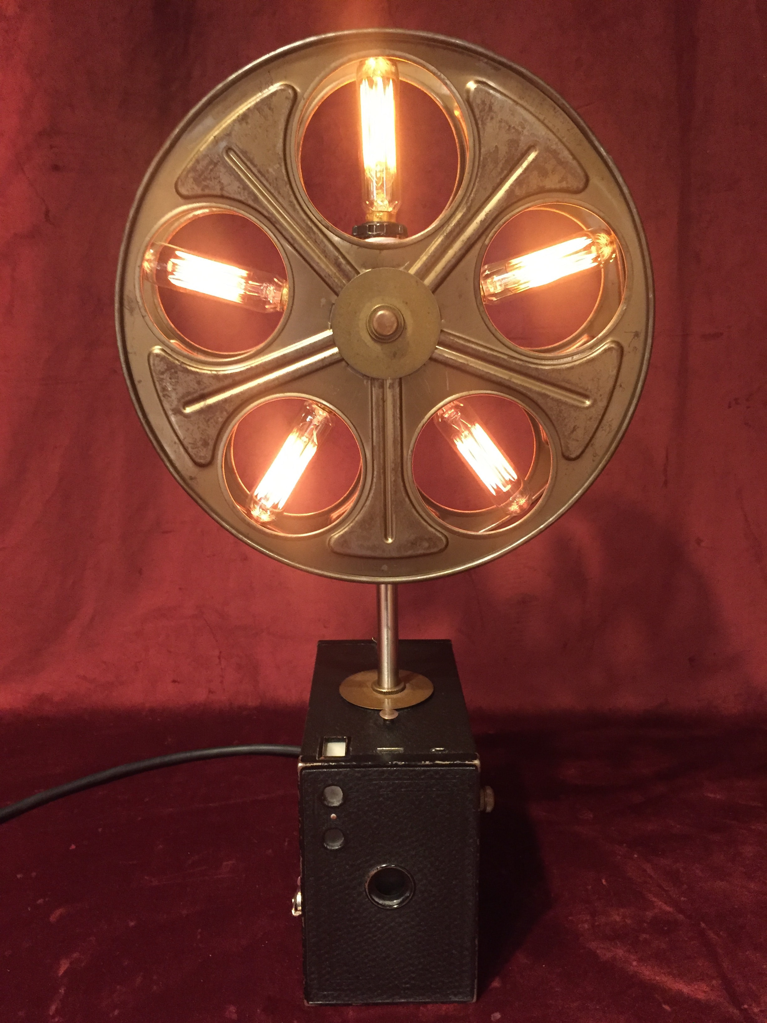 Movie Reel w/ Edison bulbs mounted on vintage box camera - Illuminated  Objects